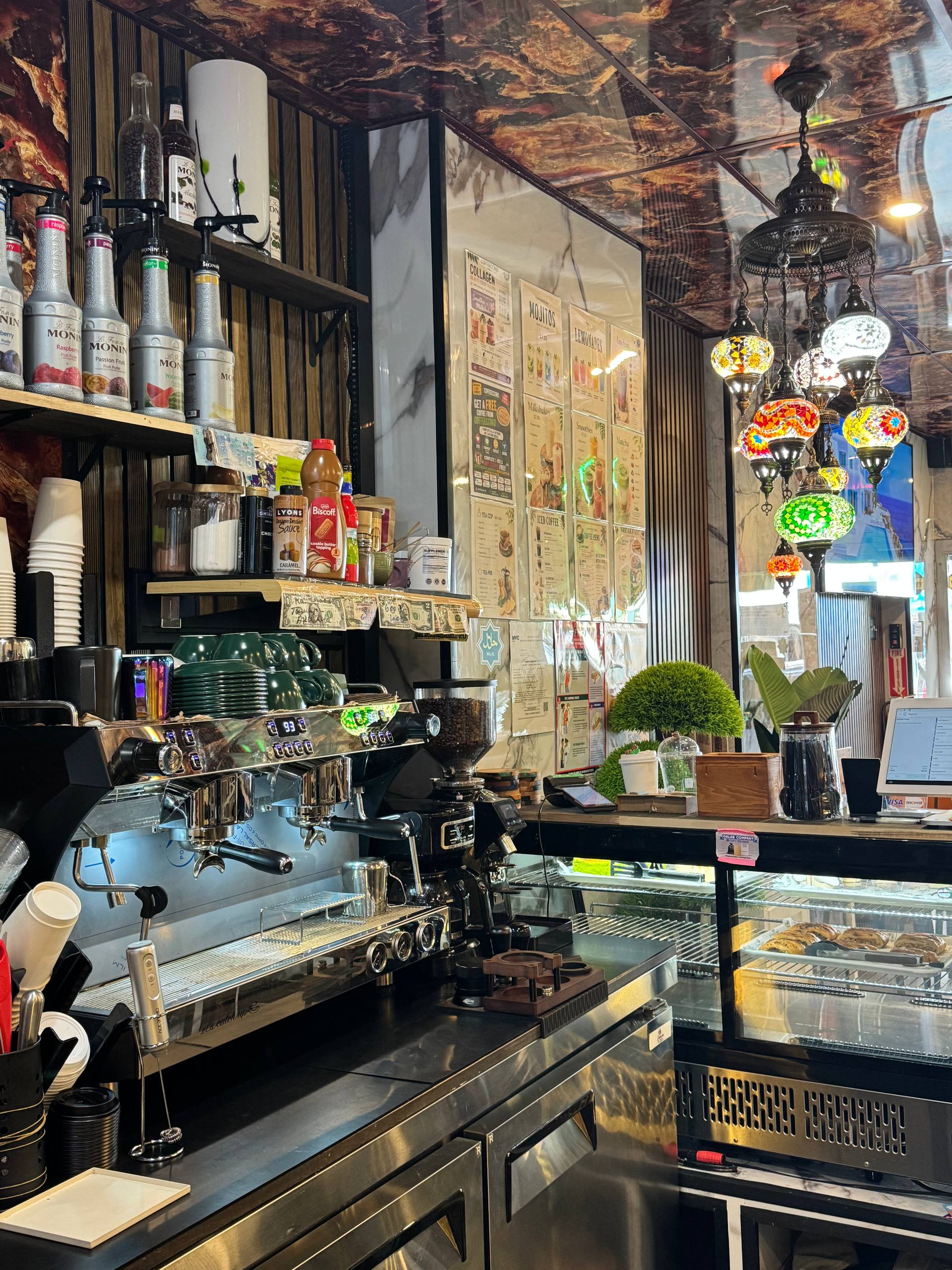 Coffeeccino espresso machine and colorful mosaic lamps